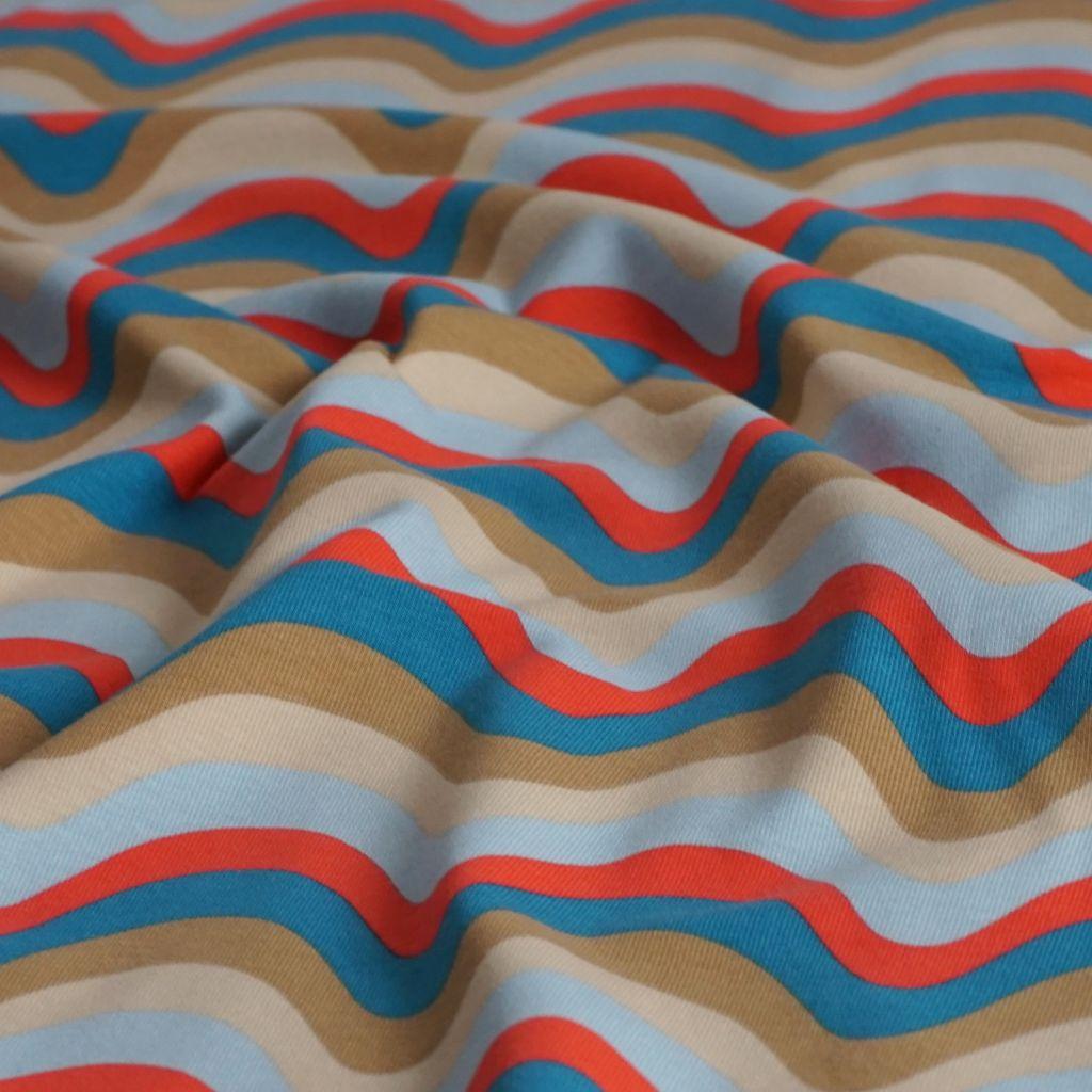 Baumwolljersey Wellen blau rot beige